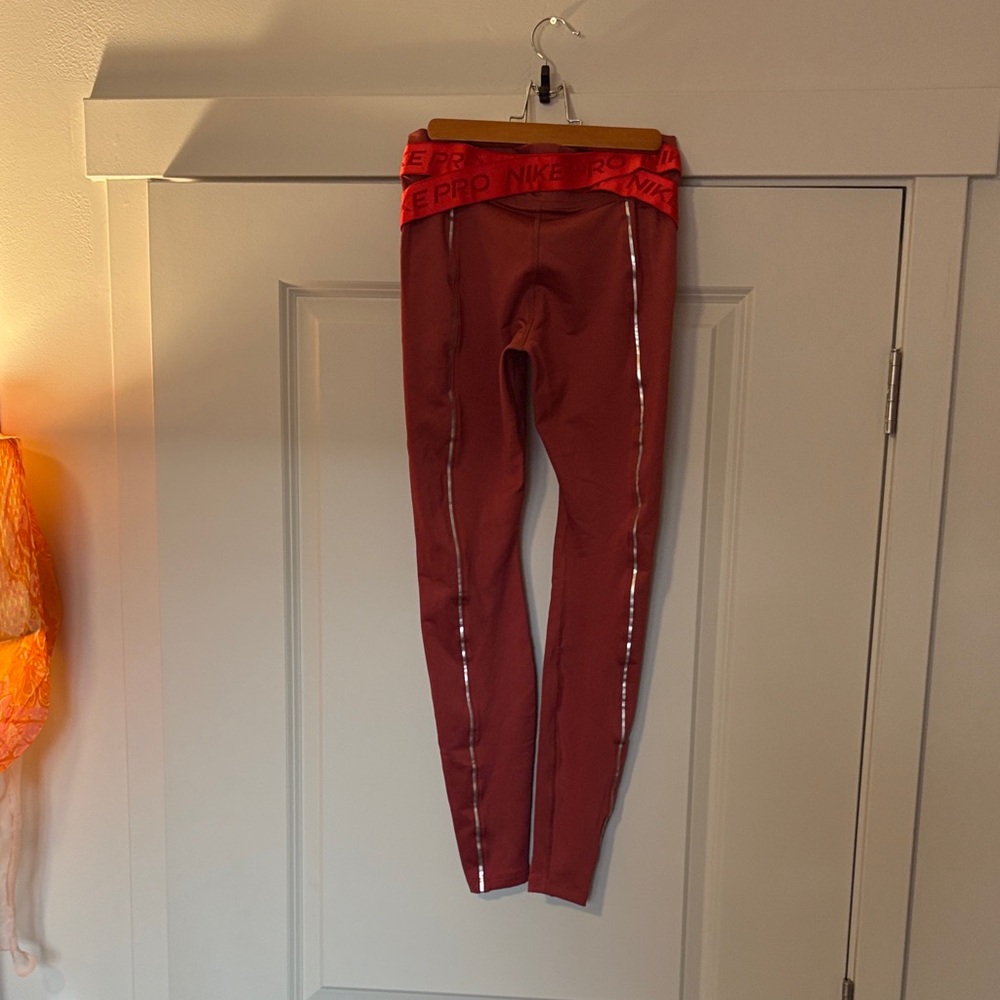 Nike women Red Leggings with Silver Accents